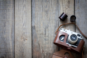 Old retro camera on vintage wooden boards